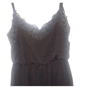 Short black dress with lace detail